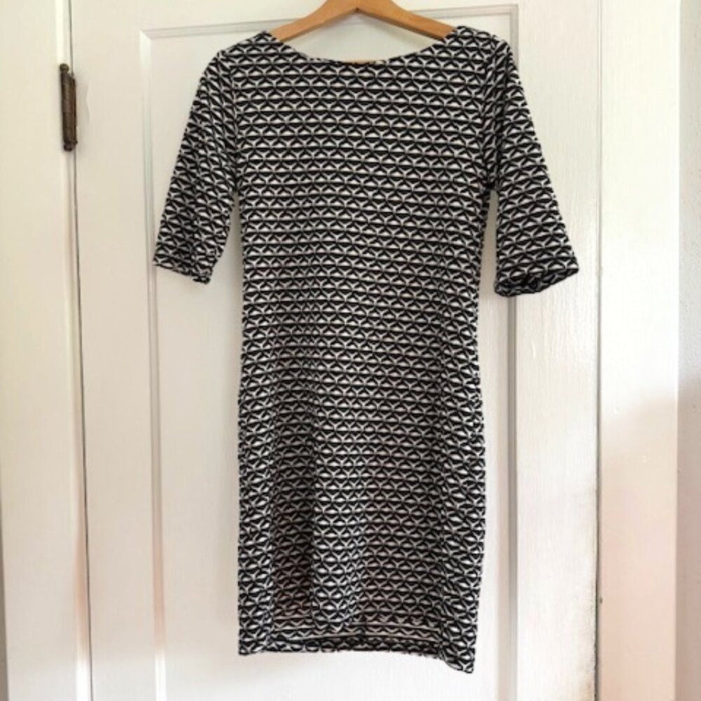 Gorgeous Black & White Dress with Red Zipper Detail